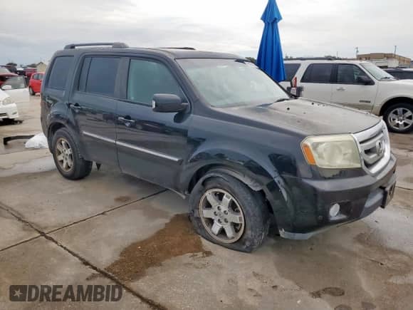 2010 Honda Pilot Touring с VIN 5FNYF4H98AB014372, выставлен на аукционе Copart как лот 68731235 с пробегом 204 851 миль миль и Чистый • Clean title. История ставок и продаж доступна на DreamBid. Изображение 4.