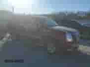 2009 Cadillac Escalade with VIN 1GYFK23229R211846, listed as a Copart auction lot 57988185 with 150,758 mi miles and Salvage title. Bid and sale history available at DreamBid. Image 4.