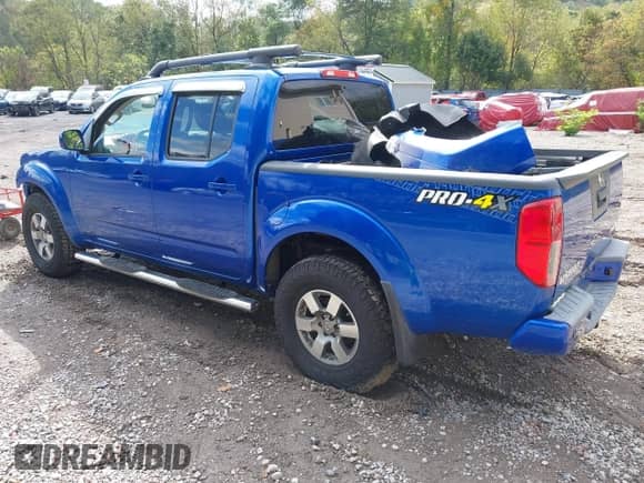 2013 Nissan Frontier SV with VIN 1N6AD0EVXDN735930, listed as a IAAI auction lot 43289388 with 26,855 mi miles and . Bid and sale history available at DreamBid. Image 3.