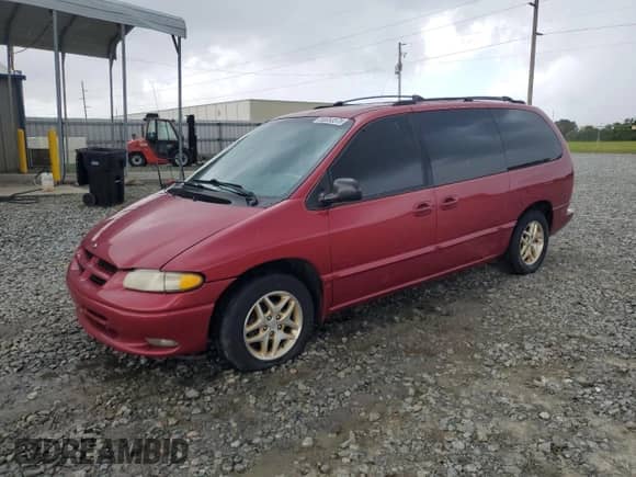 1998 Dodge Caravan LE z VIN 1B4GP54L7WB575217, wystawiony jako Copart lot #56953575 z przebiegiem 190 564 mil mil oraz Szkoda całkowita • Salvage title. Historia ofert i sprzedaży dostępna na DreamBid. Obrazek 1.