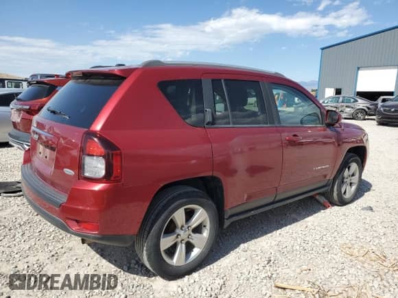 2015 Jeep Compass Latitude with VIN 1C4NJCEB5FD397611, listed as a Copart auction lot 57149015 with 130,292 mi miles and Salvage title. Bid and sale history available at DreamBid. Image 3.