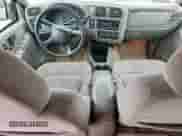 2002 Chevrolet Blazer LS with VIN 1GNCS13W32K129233, listed as a Copart auction lot 63417545 with 202,670 mi miles and Salvage title. Bid and sale history available at DreamBid. Image 8.