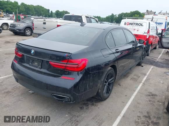 2019 BMW 7 Series 740i xDrive with VIN WBA7E4C54KGV28663, listed as a IAAI auction lot 42282060 with 73,109 mi miles and . Bid and sale history available at DreamBid. Image 4.