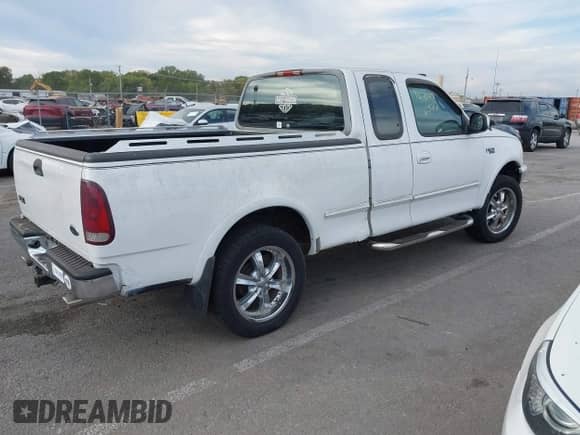 1997 Ford F-150 XL с VIN 1FTDX1867VNA04164, выставлен на аукционе IAAI как лот 43486577 с пробегом 129 591 миль миль и . История ставок и продаж доступна на DreamBid. Изображение 4.