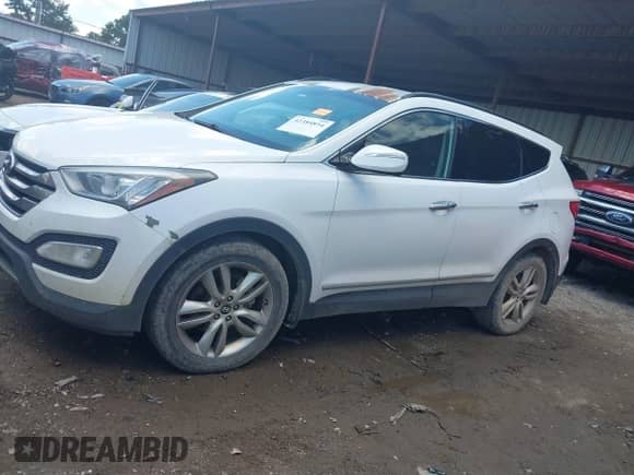 2014 Hyundai Santa Fe z VIN 5XYZUDLAXEG183108, wystawiony jako IAAI lot #42384854 z przebiegiem 160 963 mil mil oraz . Historia ofert i sprzedaży dostępna na DreamBid. Obrazek 15.