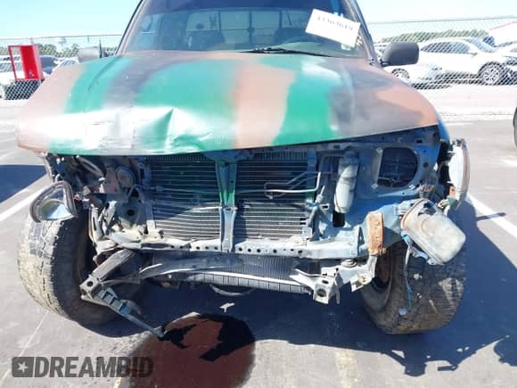 1995 Toyota Tacoma z VIN 4TAUN73C6SZ064877, wystawiony jako IAAI lot #43363619 z przebiegiem 257 444 mil mil oraz . Historia ofert i sprzedaży dostępna na DreamBid. Obrazek 6.