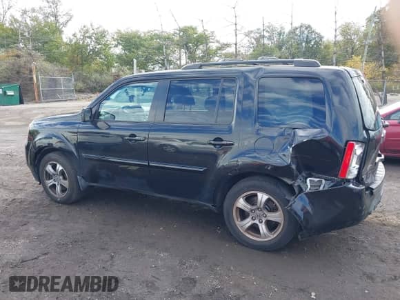 2013 Honda Pilot EX-L with VIN 5FNYF4H7XDB028857, listed as a IAAI auction lot 43404298 with 153,715 mi miles and . Bid and sale history available at DreamBid. Image 14.
