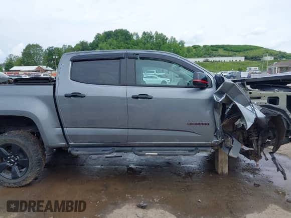 2021 Chevrolet Colorado 4WD LT with VIN 1GCGTCEN1M1105688, listed as a IAAI auction lot 42390000 with 59,181 mi miles and . Bid and sale history available at DreamBid. Image 14.