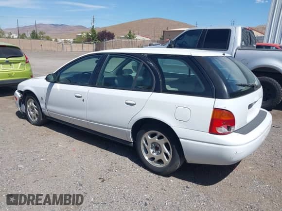 2000 Saturn SW with VIN 1G8ZN8271YZ187106, listed as a IAAI auction lot 42835585 with 174,768 mi miles and . Bid and sale history available at DreamBid. Image 3.