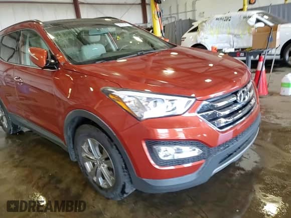 2014 Hyundai Santa Fe с VIN 5XYZUDLB4EG173103, выставлен на аукционе Copart как лот 68325335 с пробегом 65 563 миль миль и Списание • Salvage title. История ставок и продаж доступна на DreamBid. Изображение 14.