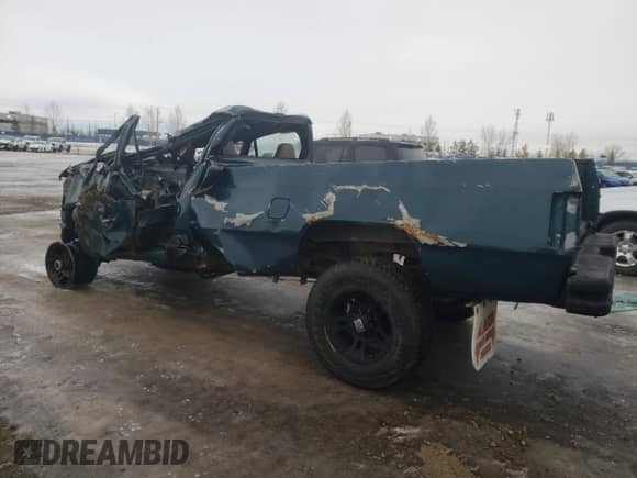 1993 Dodge D/W 250 with VIN 1B7KM26C5PS179046, listed as a Copart auction lot 84036284 with Not provided miles and Salvage title. Bid and sale history available at DreamBid. Image 2.