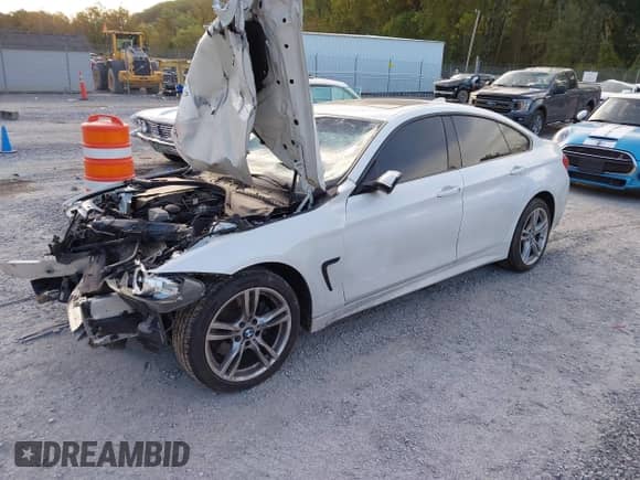 2015 BMW 4 Series 428i xDrive с VIN WBA4C9C57FD330866, выставлен на аукционе IAAI как лот 40574326 с пробегом 123 726 миль миль и . История ставок и продаж доступна на DreamBid. Изображение 18.