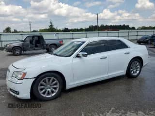 2013 Chrysler 300 C with VIN 2C3CCAETXDH508172, listed as a Copart auction lot 71185825 with 219,893 mi miles and Salvage title. Bid and sale history available at DreamBid. Image 1.