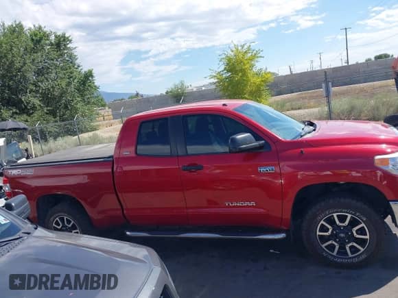 2016 Toyota Tundra SR z VIN 5TFUY5F18GX577187, wystawiony jako IAAI lot #43048514 z przebiegiem 153 302 mil mil oraz . Historia ofert i sprzedaży dostępna na DreamBid. Obrazek 13.