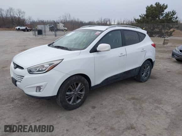 2014 Hyundai Tucson Walking Dead Edition с VIN KM8JUCAGXEU915410, выставлен на аукционе IAAI как лот 41537801 с пробегом 168 919 миль миль и . История ставок и продаж доступна на DreamBid. Изображение 2.
