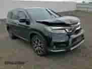 2021 Honda Pilot Touring 8-Passenger с VIN 5FNYF6H95MB045000, выставлен на аукционе Copart как лот 67716375 с пробегом 101 660 миль миль и Списание • Salvage title. История ставок и продаж доступна на DreamBid. Изображение 14.