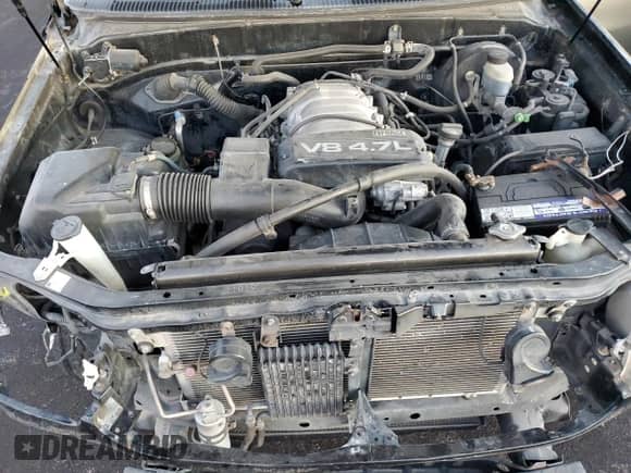 2002 Toyota Tundra SR5 z VIN 5TBRT34122S263084, wystawiony jako Copart lot #82737495 z przebiegiem 178 755 mil mil oraz Szkoda całkowita • Salvage title. Historia ofert i sprzedaży dostępna na DreamBid. Obrazek 11.