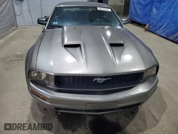 2005 Ford Mustang Deluxe с VIN 1ZVFT84NX55227418, выставлен на аукционе Copart как лот 84975425 с пробегом 149 334 миль миль и Чистый • Clean title. История ставок и продаж доступна на DreamBid. Изображение 5.