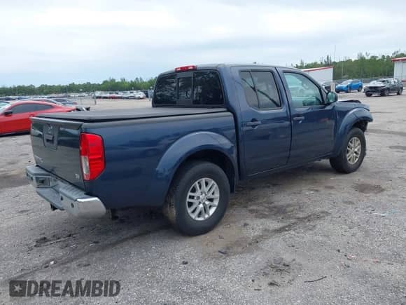 2021 Nissan Frontier SV with VIN 1N6ED0EA7MN707114, listed as a IAAI auction lot 43241145 with 49,943 mi miles and . Bid and sale history available at DreamBid. Image 4.