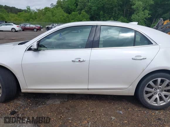 2015 Chevrolet Malibu LTZ with VIN 1G11F5SL0FF220857, listed as a IAAI auction lot 42107647 with 143,330 mi miles and . Bid and sale history available at DreamBid. Image 14.