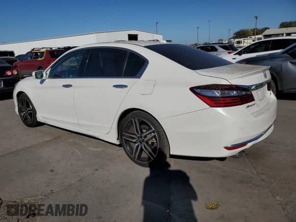 2016 Honda Accord Touring with VIN 1HGCR3F90GA035931, listed as a Copart auction lot 85592585 with 22,265 mi miles and Salvage title. Bid and sale history available at DreamBid. Image 2.