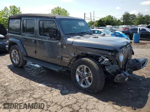 2022 Jeep Wrangler Unlimited Sahara with VIN 1C4HJXENXNW244773, listed as a Copart auction lot 59694095 with 21,871 mi miles and Salvage title. Bid and sale history available at DreamBid. Image 4.