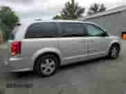 2011 Dodge Grand Caravan Crew with VIN 2D4RN5DG6BR660911, listed as a Copart auction lot 69046235 with 125,072 mi miles and Clean title. Bid and sale history available at DreamBid. Image 3.