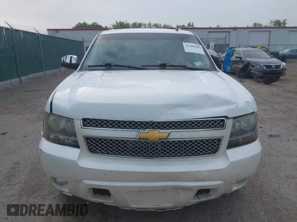 2010 Chevrolet Tahoe LTZ with VIN 1GNUKCE03AR101284, listed as a IAAI auction lot 42489604 with 196,786 mi miles and . Bid and sale history available at DreamBid. Image 12.
