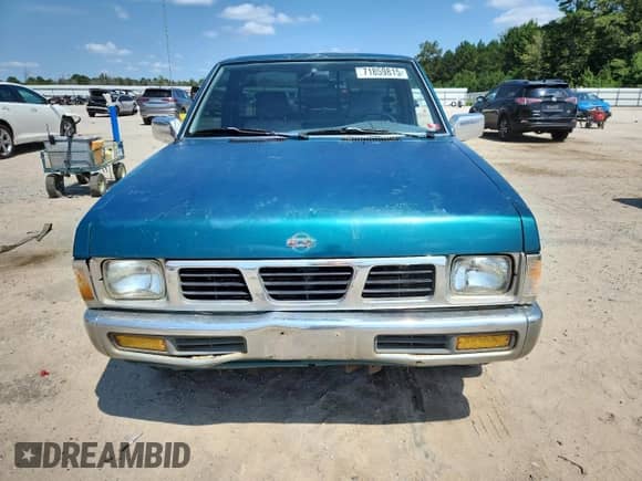 1995 Nissan Frontier with VIN 1N6SD11S3SC358078, listed as a Copart auction lot 71859815 with 118,833 mi miles and Salvage title. Bid and sale history available at DreamBid. Image 5.