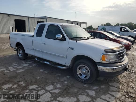 2001 Ford F-150 XL with VIN 1FTZX17231KF34373, listed as a Copart auction lot 68665815 with 161,328 mi miles and Clean title. Bid and sale history available at DreamBid. Image 4.