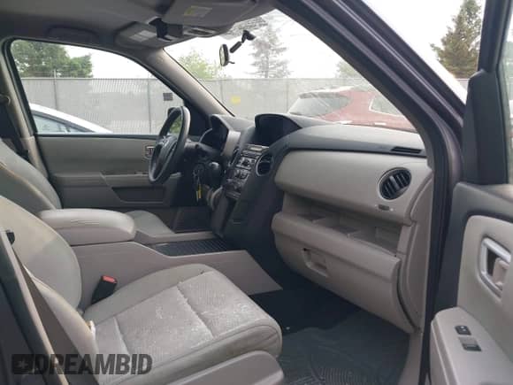 2015 Honda Pilot LX with VIN 5FNYF4H24FB013455, listed as a IAAI auction lot 42409520 with 152,718 mi miles and . Bid and sale history available at DreamBid. Image 5.