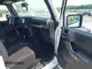 2014 Jeep Wrangler Sport with VIN 1C4AJWAG8EL276335, listed as a IAAI auction lot 42874697 with 115,070 mi miles and . Bid and sale history available at DreamBid. Image 5.