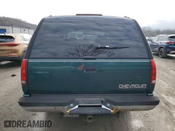 1995 Chevrolet Suburban с VIN 1GNGK26K8SJ406190, выставлен на аукционе Copart как лот 84103234 с пробегом 145 731 миль миль и Чистый • Clean title. История ставок и продаж доступна на DreamBid. Изображение 6.