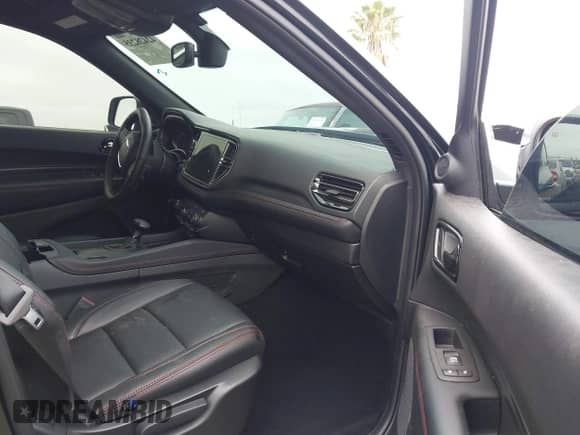 2025 Dodge Durango R/T Plus with VIN 1C4SDJCT6SC503445, listed as a IAAI auction lot 42428235 with 7,142 mi miles and . Bid and sale history available at DreamBid. Image 5.