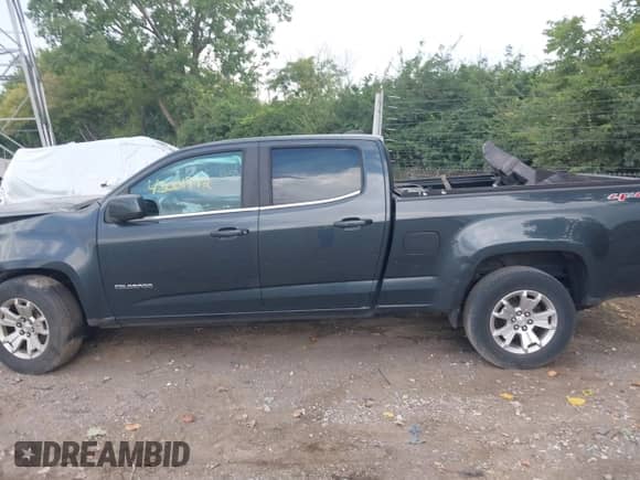2018 Chevrolet Colorado 4WD LT with VIN 1GCGTCEN2J1148884, listed as a IAAI auction lot 43001742 with 97,894 mi miles and . Bid and sale history available at DreamBid. Image 14.