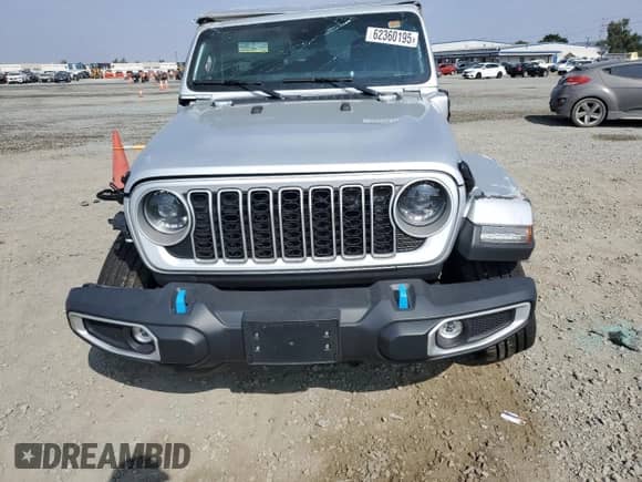 2024 Jeep Wrangler Sahara with VIN 1C4RJXP69RW303652, listed as a Copart auction lot 62360195 with 7,518 mi miles and Salvage title. Bid and sale history available at DreamBid. Image 5.