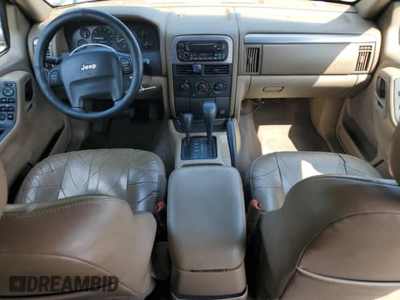 2002 Jeep Grand Cherokee Sport with VIN 1J4GW38S82C157727, listed as a Copart auction lot 82059755 with 159,779 mi miles and Salvage title. Bid and sale history available at DreamBid. Image 8.