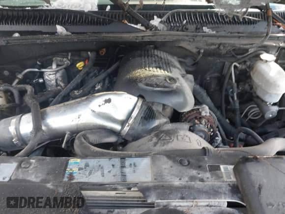 2003 Chevrolet Silverado 1500HD LS z VIN 1GCGK13U13F203025, wystawiony jako IAAI lot #41419011 z przebiegiem Nie podano mil oraz . Historia ofert i sprzedaży dostępna na DreamBid. Obrazek 10.