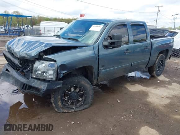 2007 Chevrolet Silverado 1500 Work Truck with VIN 2GCEK13C871577160, listed as a IAAI auction lot 42189074 with 140,269 mi miles and . Bid and sale history available at DreamBid. Image 18.