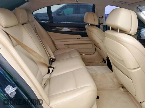 2013 BMW 7 Series 750Li с VIN WBAYE8C54DD132832, выставлен на аукционе Copart как лот 63086555 с пробегом Не указан миль и Списание • Salvage title. История ставок и продаж доступна на DreamBid. Изображение 10.