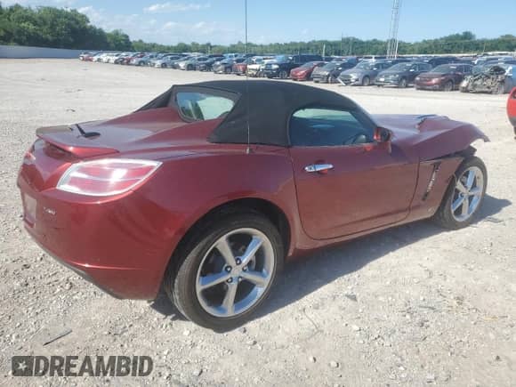 2009 Saturn Sky Red Line with VIN 1G8MF35XX9Y100011, listed as a Copart auction lot 57884065 with 104,714 mi miles and Salvage title. Bid and sale history available at DreamBid. Image 3.
