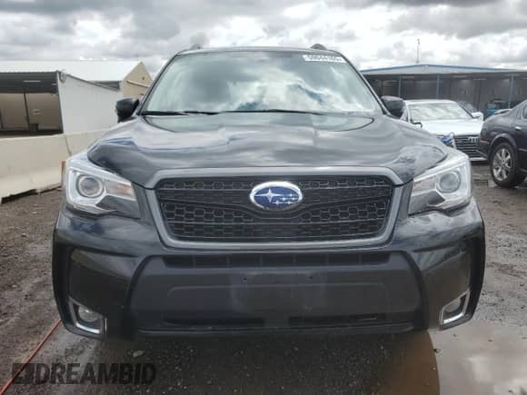 2017 Subaru Forester Touring z VIN JF2SJGWC2HH432961, wystawiony jako Copart lot #59044165 z przebiegiem 58 716 mil mil oraz Szkoda całkowita • Salvage title. Historia ofert i sprzedaży dostępna na DreamBid. Obrazek 5.