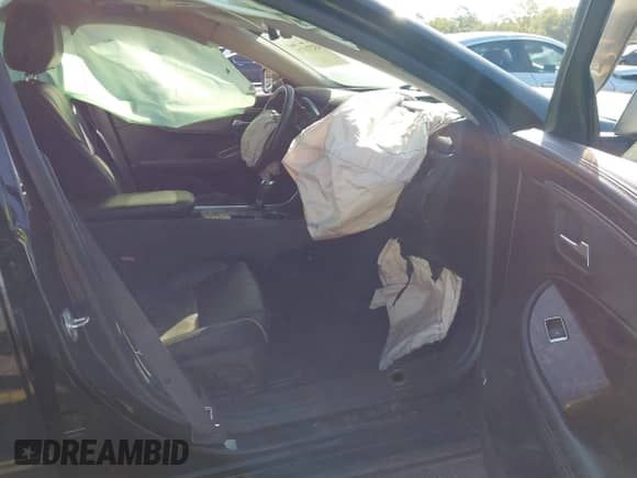 2015 Chevrolet Impala LT z VIN 1G1125S30FU145844, wystawiony jako IAAI lot #43271171 z przebiegiem 205 673 mil mil oraz . Historia ofert i sprzedaży dostępna na DreamBid. Obrazek 5.