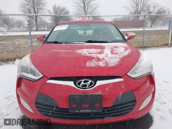 2014 Hyundai Veloster z VIN KMHTC6AD8EU214612, wystawiony jako IAAI lot #41258820 z przebiegiem 61 984 mil mil oraz . Historia ofert i sprzedaży dostępna na DreamBid. Obrazek 12.