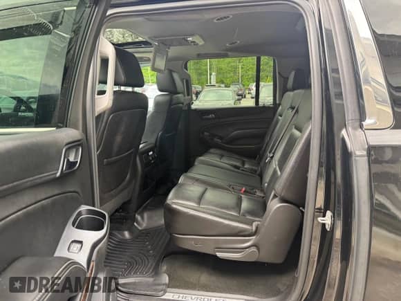 2015 Chevrolet Suburban LT с VIN 1GNSKJKC7FR205746, выставлен на аукционе Copart как лот 59420605 с пробегом 183 842 миль миль и Чистый • Clean title. История ставок и продаж доступна на DreamBid. Изображение 6.