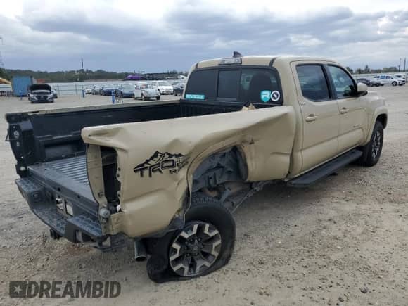 2017 Toyota Tacoma SR5 with VIN 3TMBZ5DN9HM012089, listed as a Copart auction lot 86295415 with 221,378 mi miles and Salvage title. Bid and sale history available at DreamBid. Image 3.