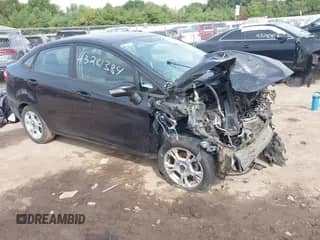 2015 Ford Fiesta SE with VIN 3FADP4BJXFM219960, listed as a IAAI auction lot 43281384 with 122,876 mi miles and . Bid and sale history available at DreamBid. Image 1.