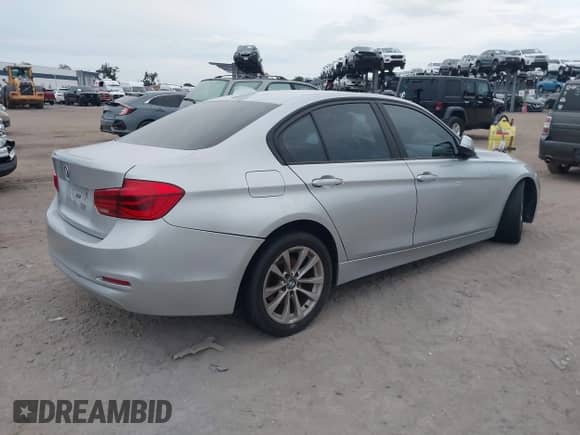 2018 BMW 3 Series 320i with VIN WBA8A9C51JAH12024, listed as a IAAI auction lot 43198146 with 98,143 mi miles and . Bid and sale history available at DreamBid. Image 4.