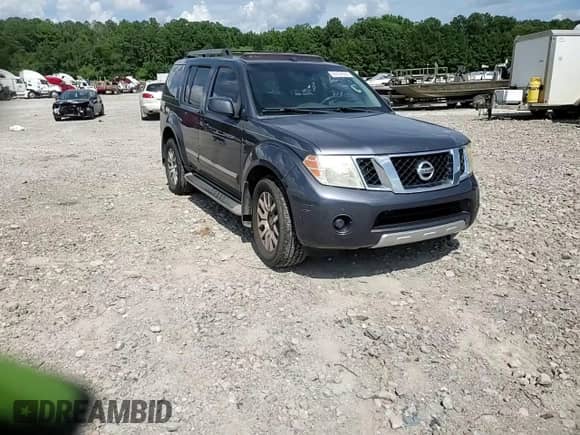 2011 Nissan Pathfinder LE z VIN 5N1AR1NB5BC601881, wystawiony jako Copart lot #65109305 z przebiegiem 212 639 mil mil oraz Szkoda całkowita • Salvage title. Historia ofert i sprzedaży dostępna na DreamBid. Obrazek 14.