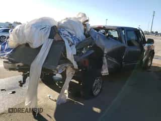 1999 Chevrolet Silverado 2500 LS с VIN 1GCGC29UXXE197487, выставлен на аукционе Copart как лот 80364804 с пробегом Не указан миль и На запчасти • Non repairable. История ставок и продаж доступна на DreamBid. Изображение 4.